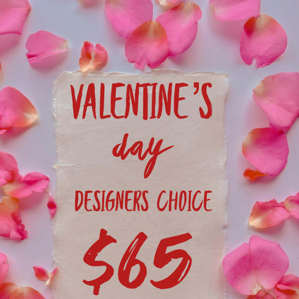 Pink rose petals around a Valentine’s Day sign with $65 text