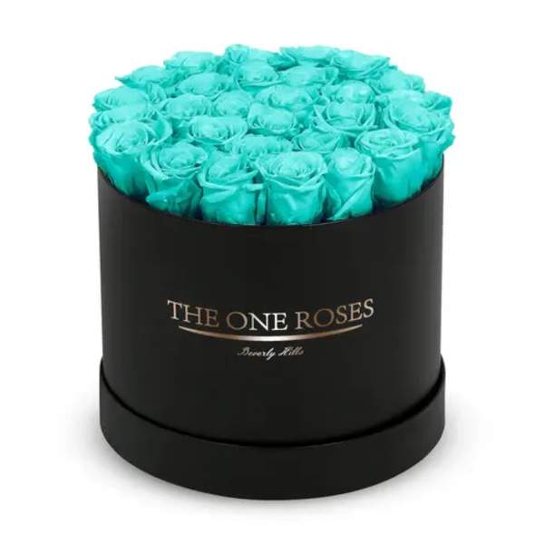 Round box of turquoise roses with a black base