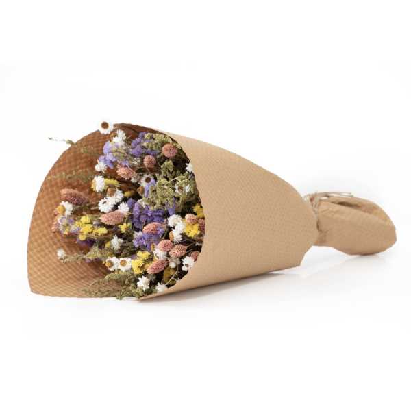 Wrapped bouquet of small dried flowers in pastel colors