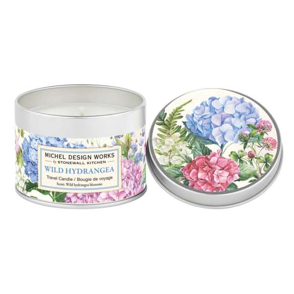 Two floral travel candles in silver tins with hydrangea labels