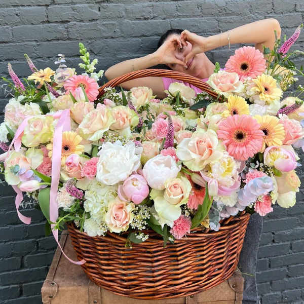 Large pastel flower basket with pink and white blooms
