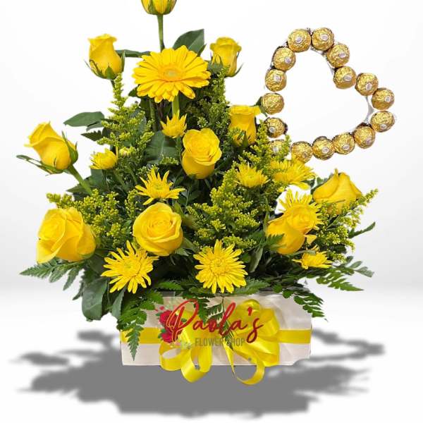 Yellow roses and daisies in a box with a Ferrero Rocher heart