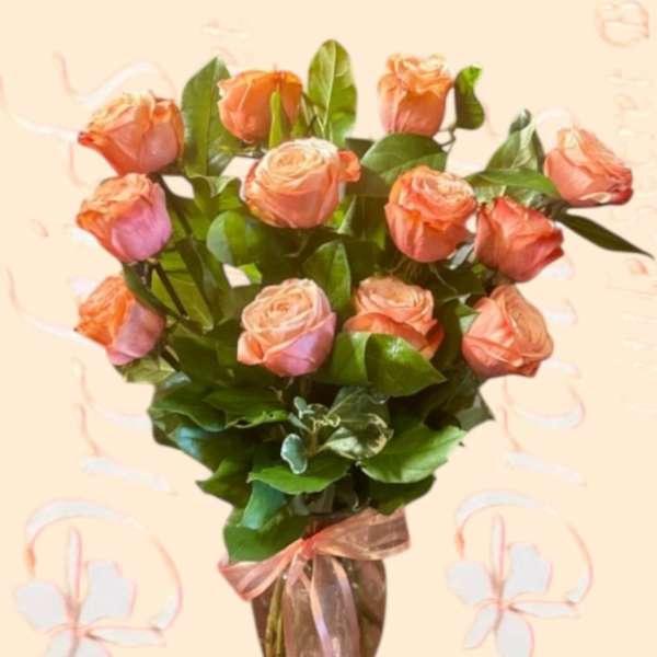 Bouquet of peach roses with a pink ribbon wrap