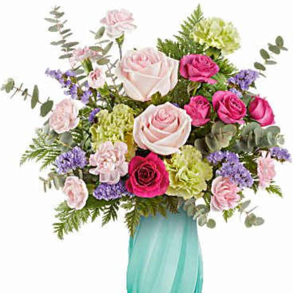 Pink and white roses with purple filler in a turquoise vase