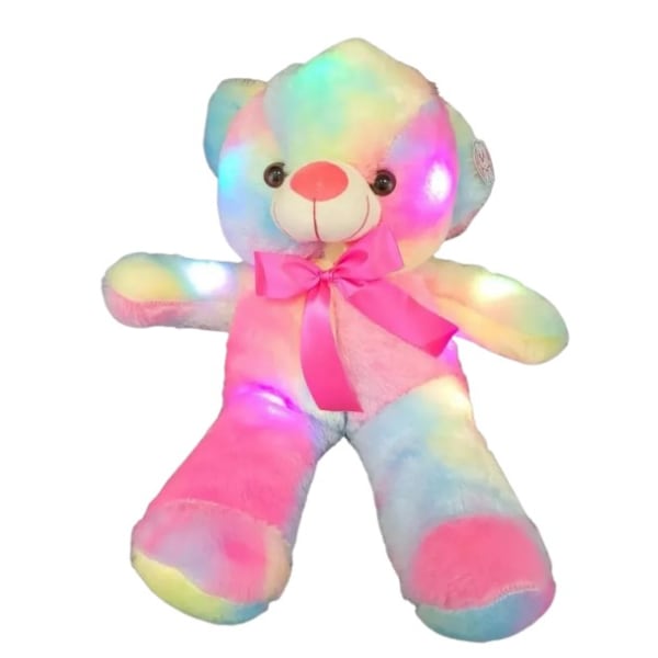 Large rainbow plush teddy bear with glowing lights and pink bow