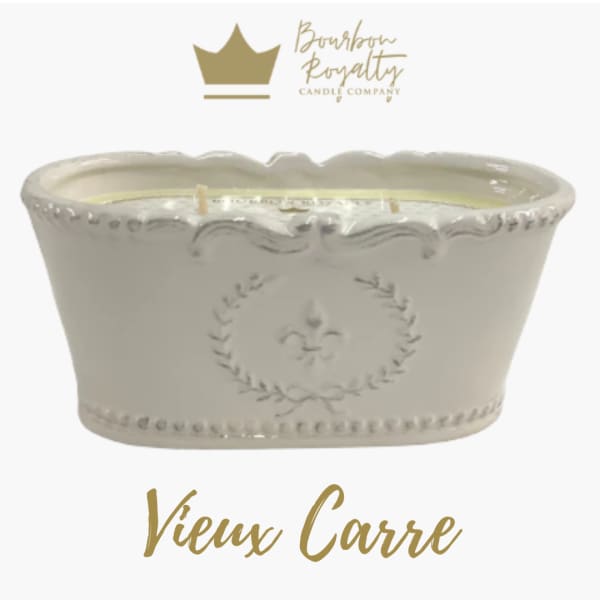 Cream ceramic candle vessel with ornate embossed detailing