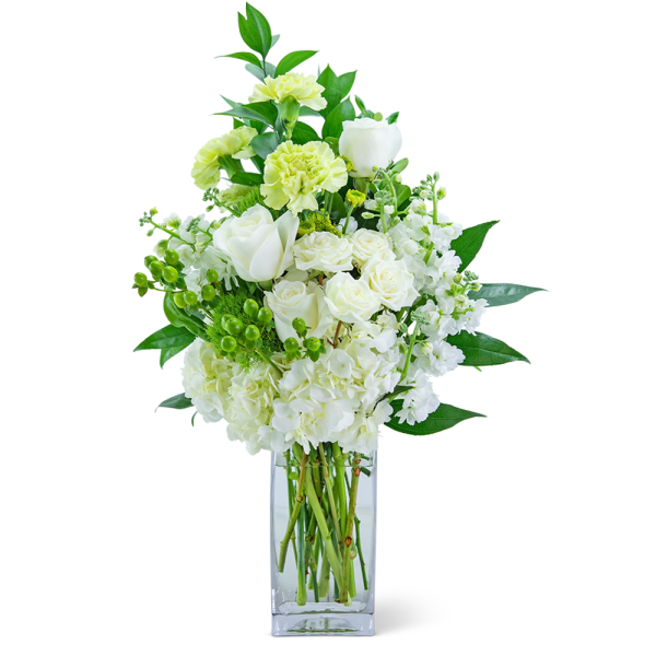 White and pale green floral arrangement in a clear glass vase
