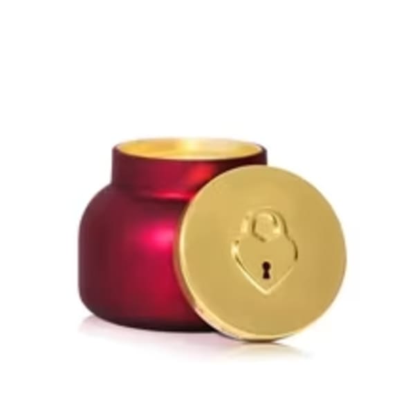 Red and gold decorative jar with a heart-shaped lock lid