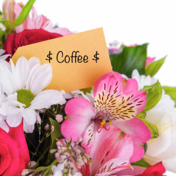 Bouquet of pink and white flowers with a coffee gift card