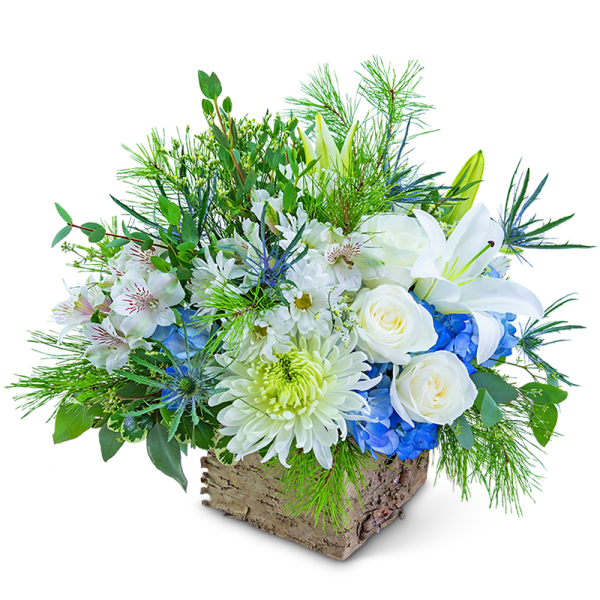 White and blue floral arrangement in a rustic wooden container