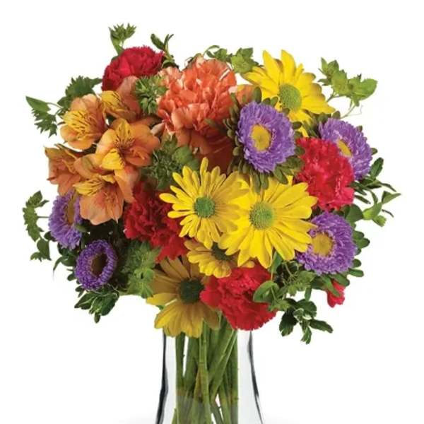 Colorful mixed bouquet in a clear glass vase