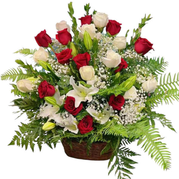 Basket arrangement of red and white roses with lilies
