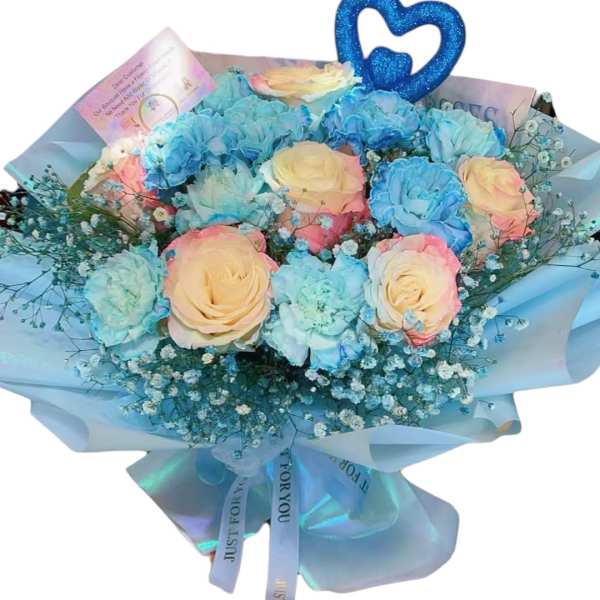 Bouquet of pastel roses and blue carnations with a glittery heart topper