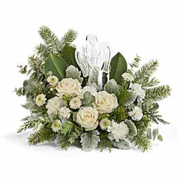 White roses and small white flowers arranged with greenery