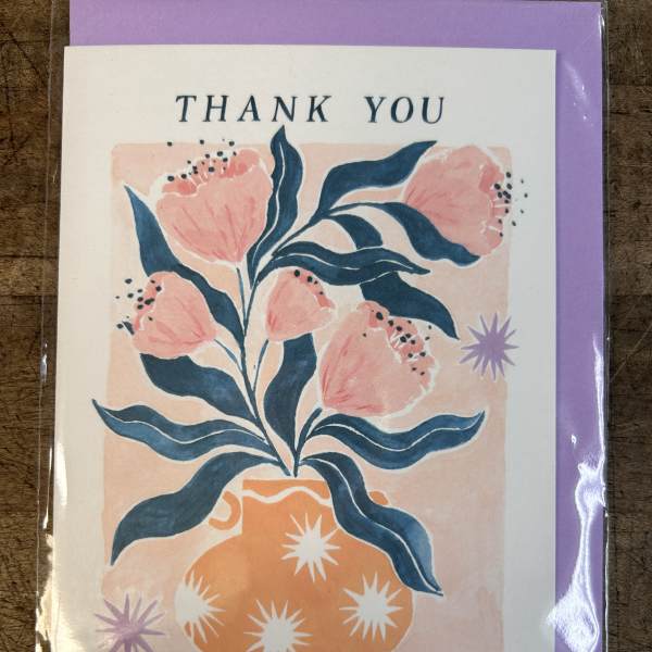 Thank you card with illustration of pink flowers in an orange patterned vase on a lavender backing.