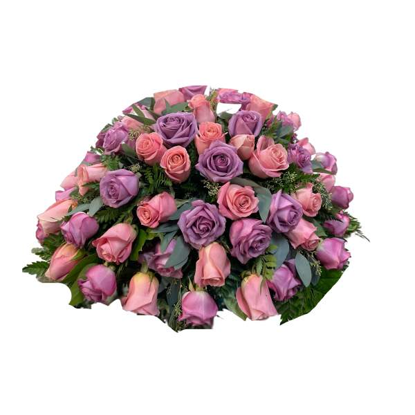 Bouquet of pink and lavender roses with greenery