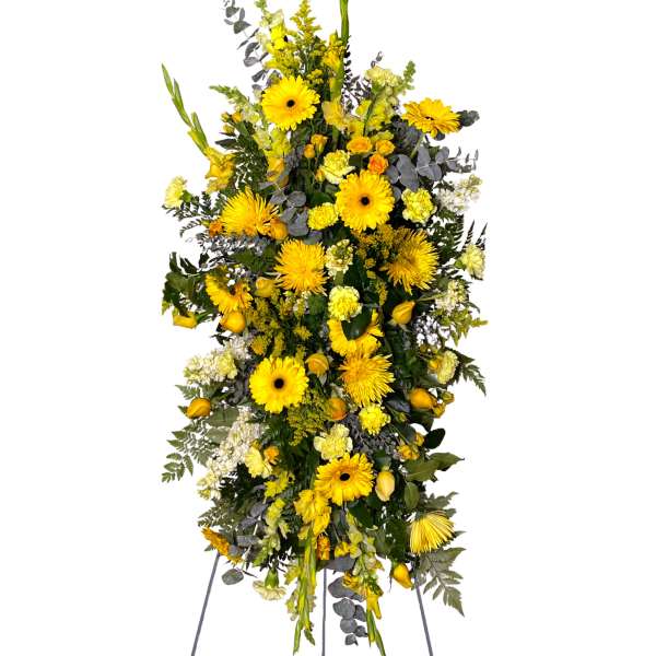 Tall yellow floral standing spray on an easel