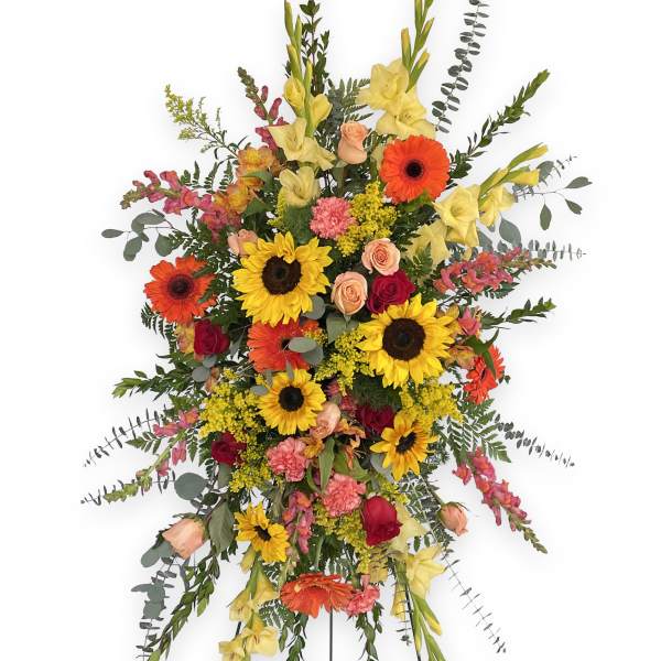 Large standing spray with sunflowers, gerbera daisies, roses, and yellow gladiolus