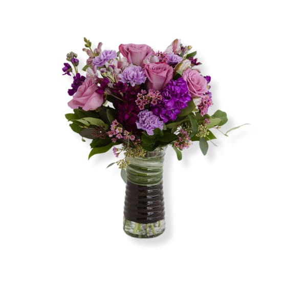 Pink and purple bouquet in a glass vase