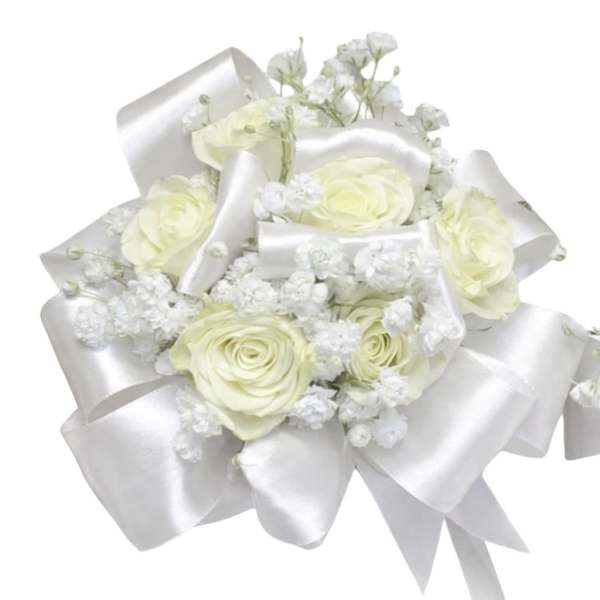 White rose bouquet with baby's breath and satin ribbon wrap
