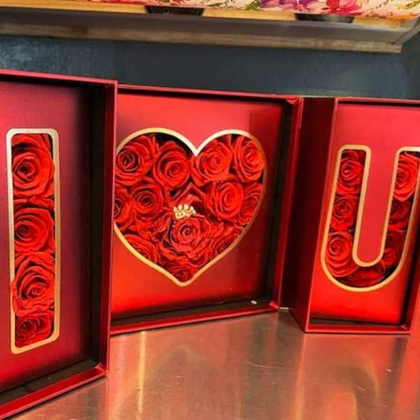 Red rose box set spelling I heart U with roses packed inside red rectangular frames