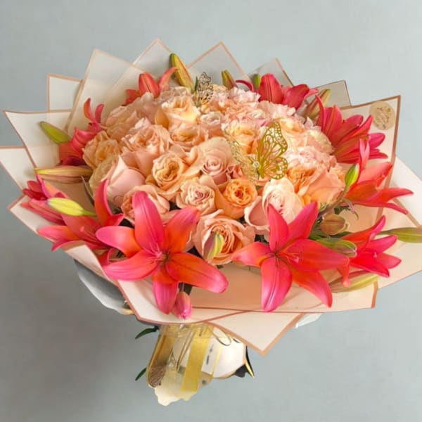 Peach Roses & Lilys Bouquet by D'Lily's Flowers