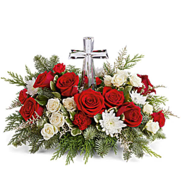 Red and white rose arrangement with a clear cross centerpiece