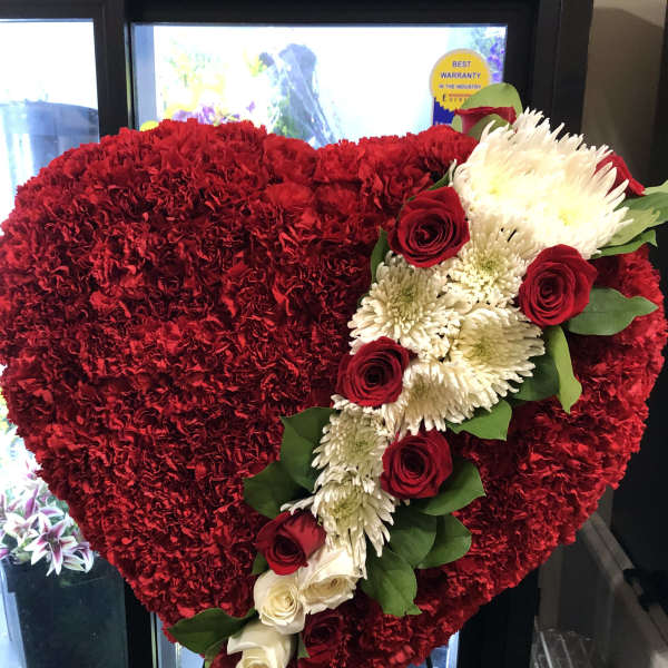 Heart-shaped red floral spray with white roses and red roses