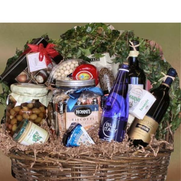 Gift basket with wine, cookies, olives, and other gourmet items