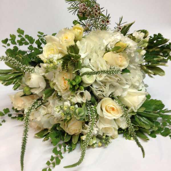 White and cream floral bouquet with roses and hydrangeas