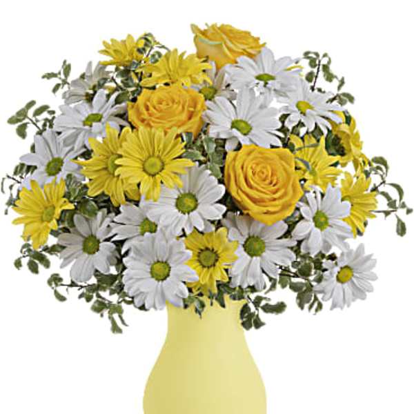 Yellow roses and white daisies in a yellow vase
