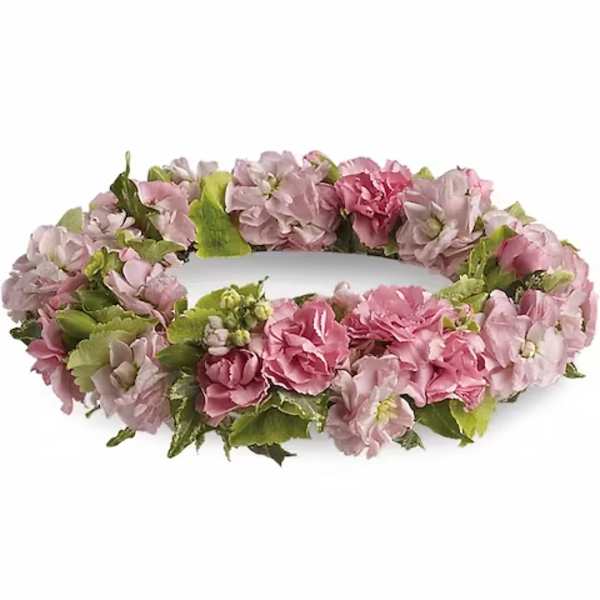 Pink and lavender floral wreath with green leaves