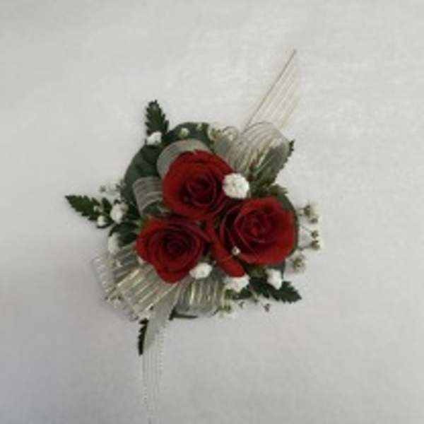 Red rose boutonniere with white filler and ribbon
