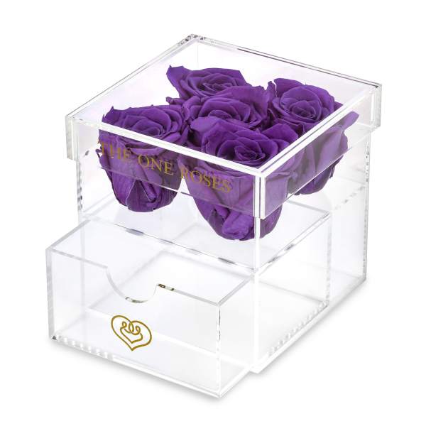 Purple roses in a clear acrylic box with a drawer