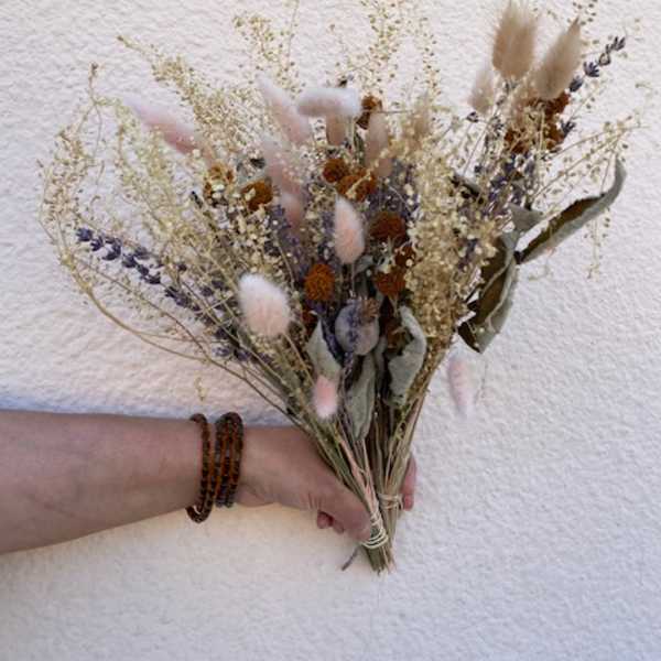 Dried bouquet with pink bunny tails and beige grasses