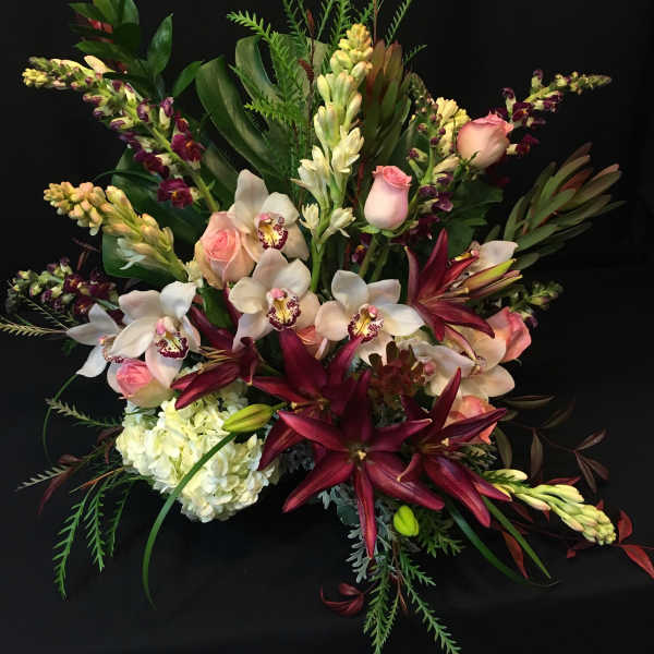 Tropical Display of Roses, Lilies and Orchids