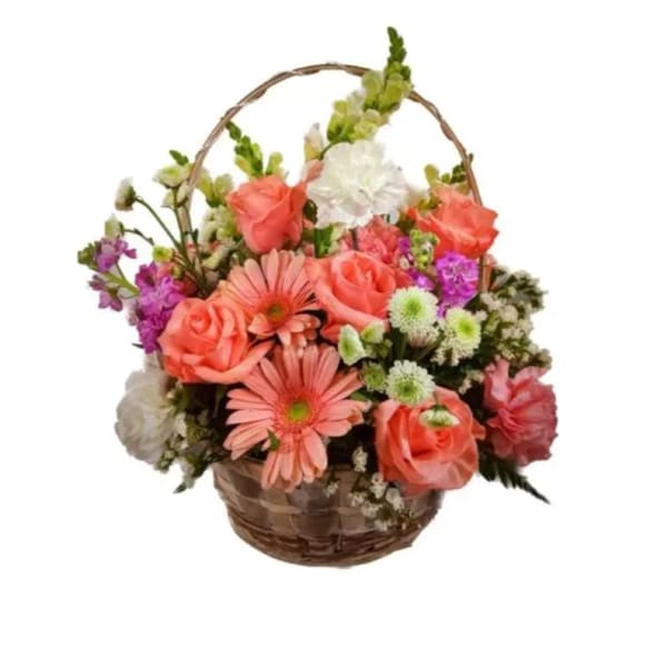 Basket arrangement of coral roses, pink daisies, and white blooms