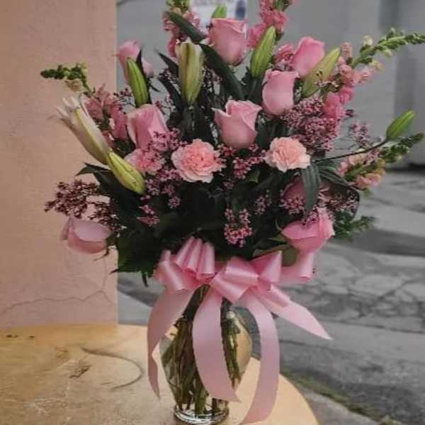 Blush roses & blush carnations.