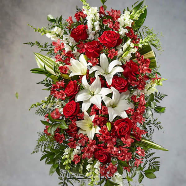 Standing floral spray with red roses and white lilies