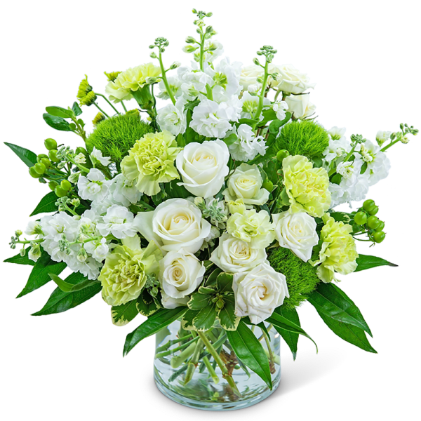 White and pale green floral arrangement in a clear glass vase