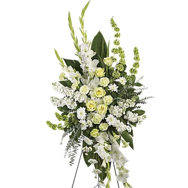 White and pale green standing floral spray on an easel