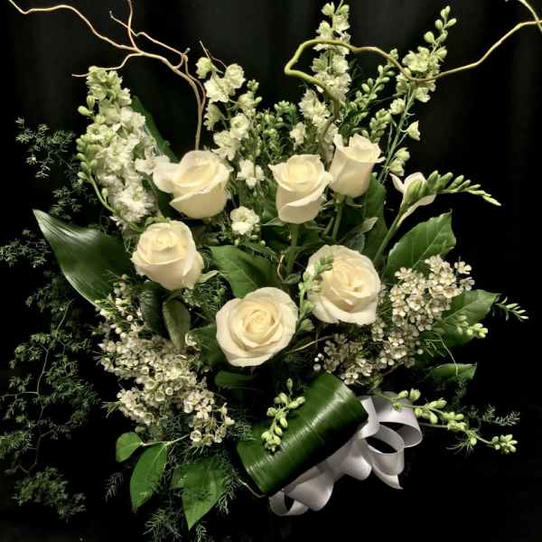 Pure white bouquet with roses and willow