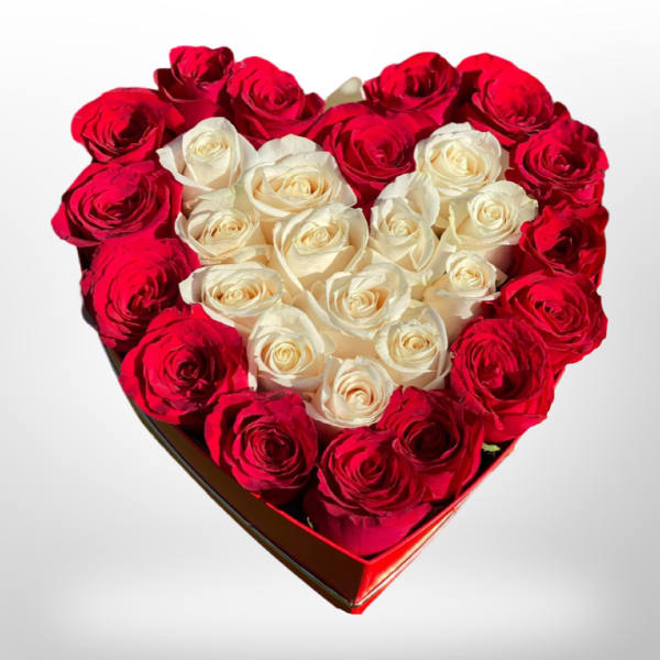 Heart-shaped box of red and white roses