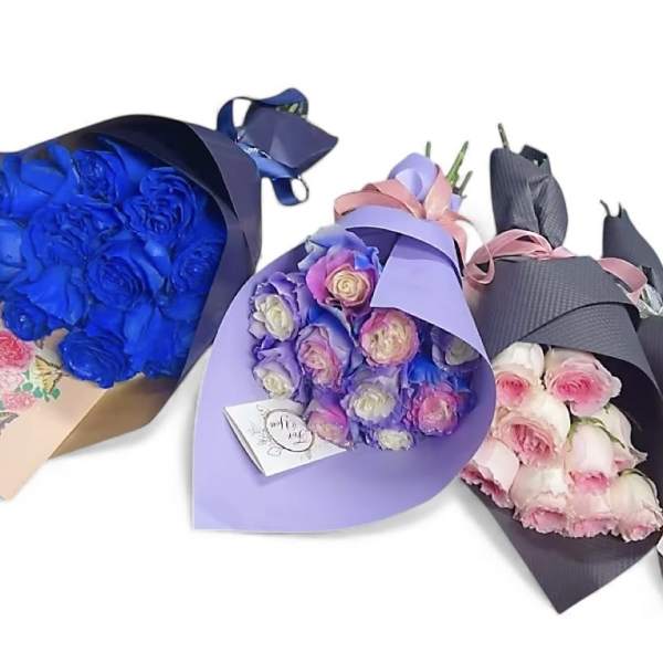 Three wrapped bouquets of roses in blue, lavender, and pink