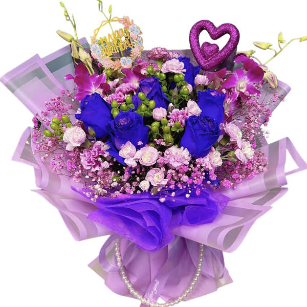 Purple bouquet with roses, orchids, and a birthday topper