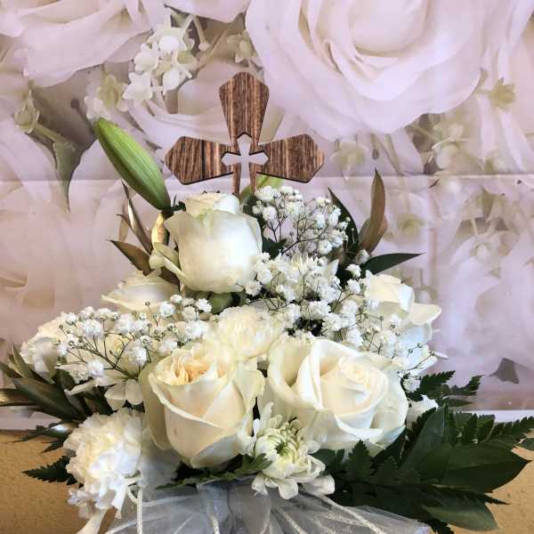 White rose bouquet with baby's breath and a wooden cross topper