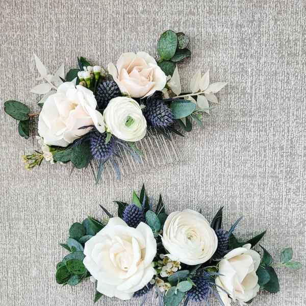 Two floral hair combs with white roses and greenery