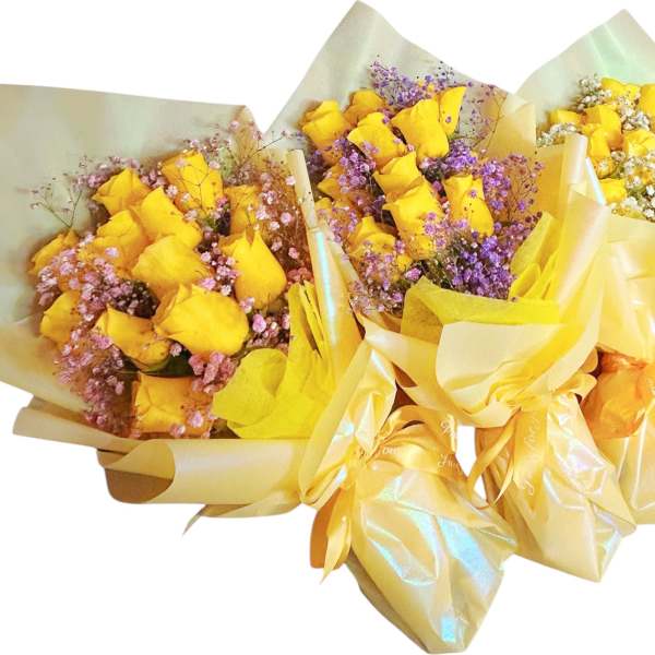 Three yellow rose bouquets wrapped in pale gold paper