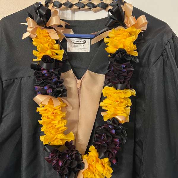 Black and yellow lei with black and gold ribbon