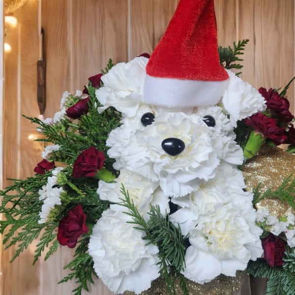 White floral teddy bear with a red Santa hat and burgundy accents
